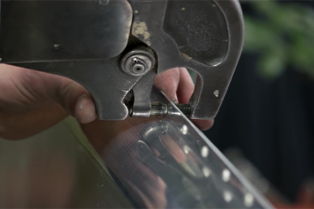 Diagram showing the steps to install an aircraft rivet, demonstrating how it permanently fastens two sheets of metal