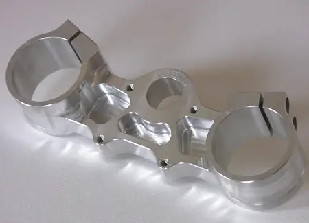 Precision 3-axis CNC machined aluminum bracket featuring tight tolerance planar surfaces and hole patterns.
