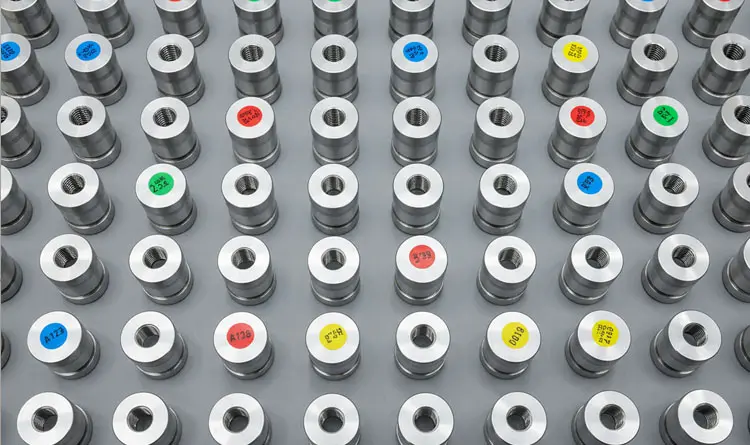 High-volume CNC machined components ready for final quality inspection and shipment.