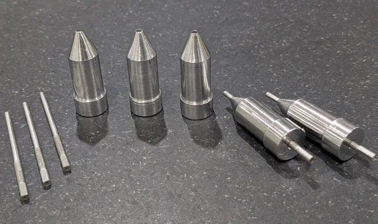 Precision machined metal prototypes used for design validation and DFM testing at Clarwe.