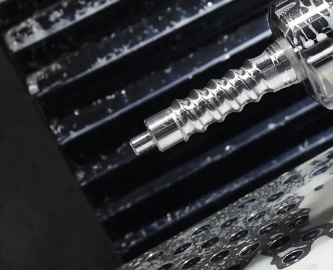 High-torque CNC hard milling of an Inconel superalloy component, demonstrating vibration-dampening stability for HRC 50+ materials without secondary EDM